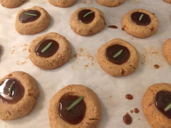 Several polvorones on a baking sheet